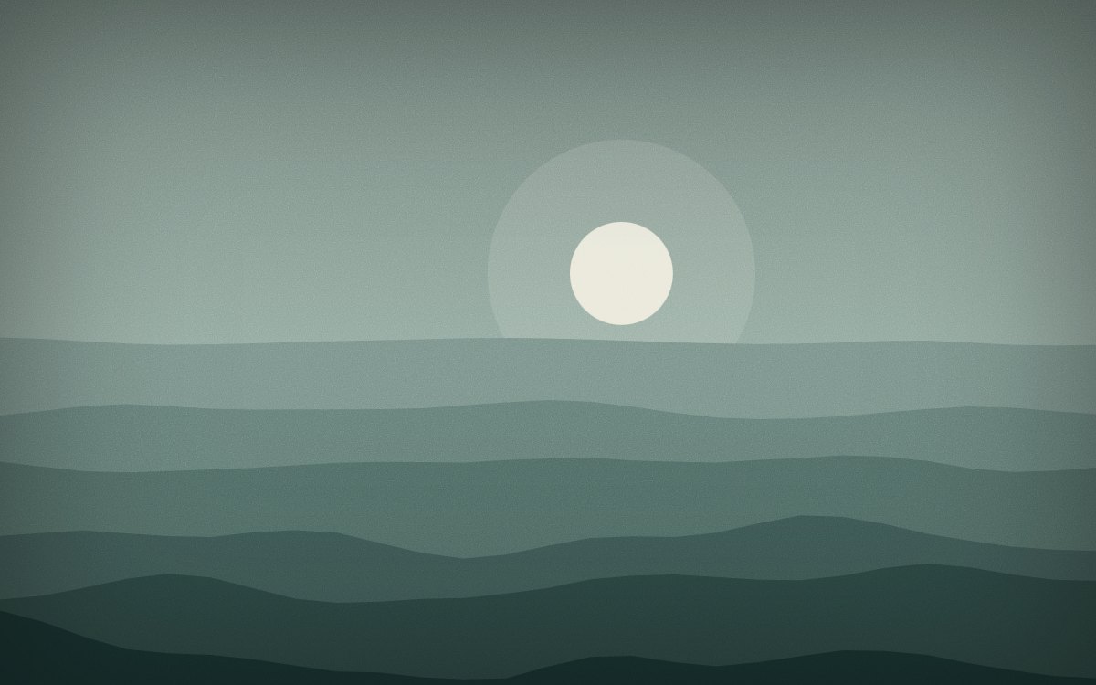 Morning haze over low green ridges